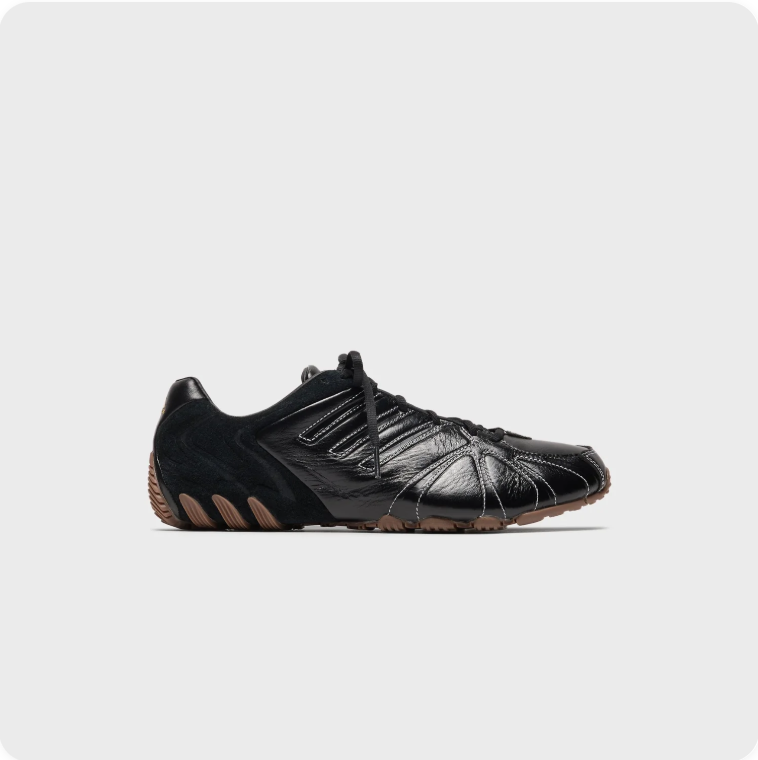 Black Low-Top Sneakers – Contrast Stitching & Brown Sole Accents
