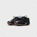 Black Low-Top Sneakers – Contrast Stitching & Brown Sole Accents